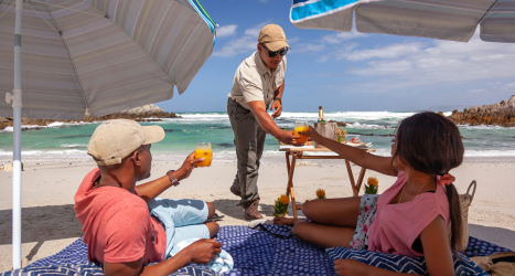 web_grootbos_couple_picnic_walker_bay_beach.jpg